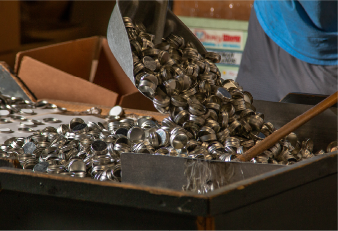 Metal stamping operation producing precision-formed components during manufacturing.